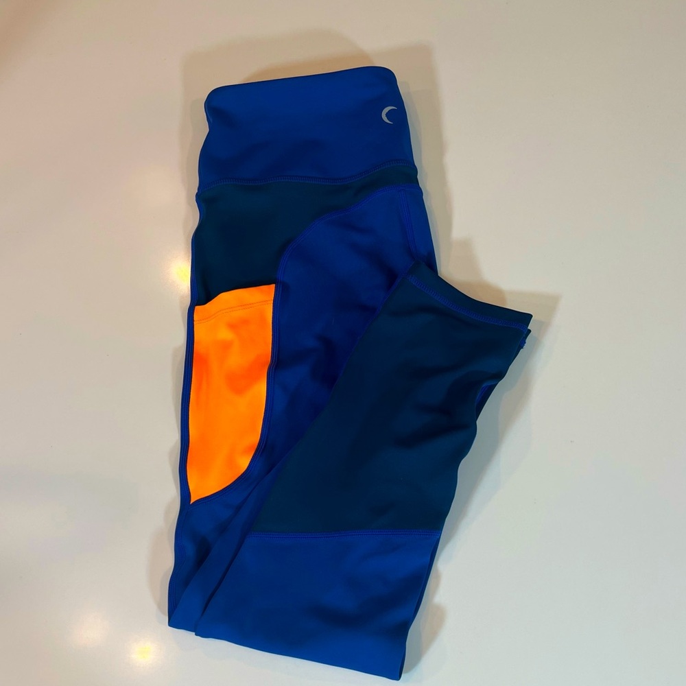 Zyia Active Blue and Orange Leggings
Size 6-8